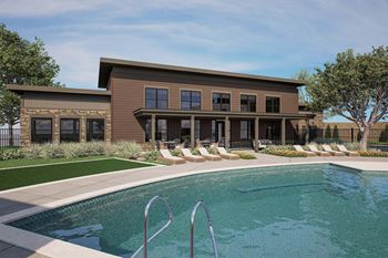 Swimming pool with lounge chairs and modern two story residence